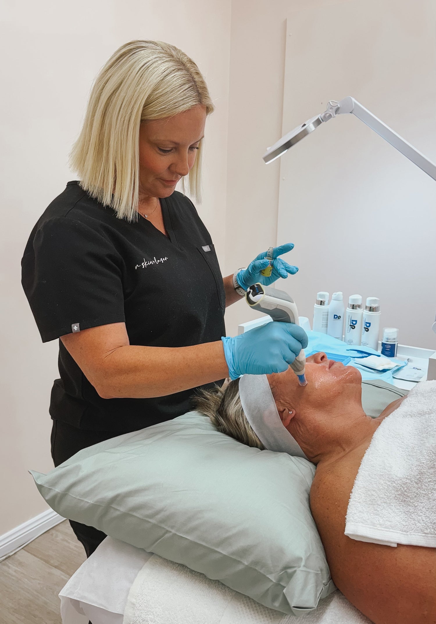 women receiving a skin needling treatment