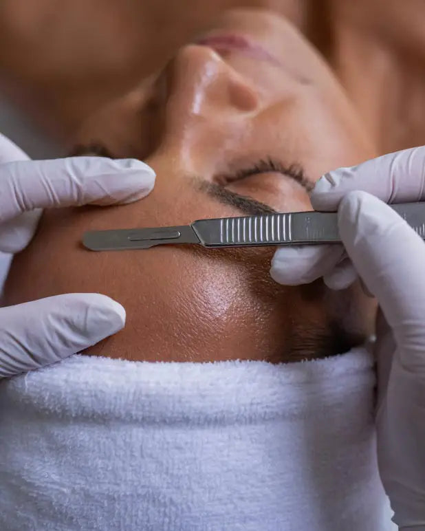 dermplaning facial treatment in progress